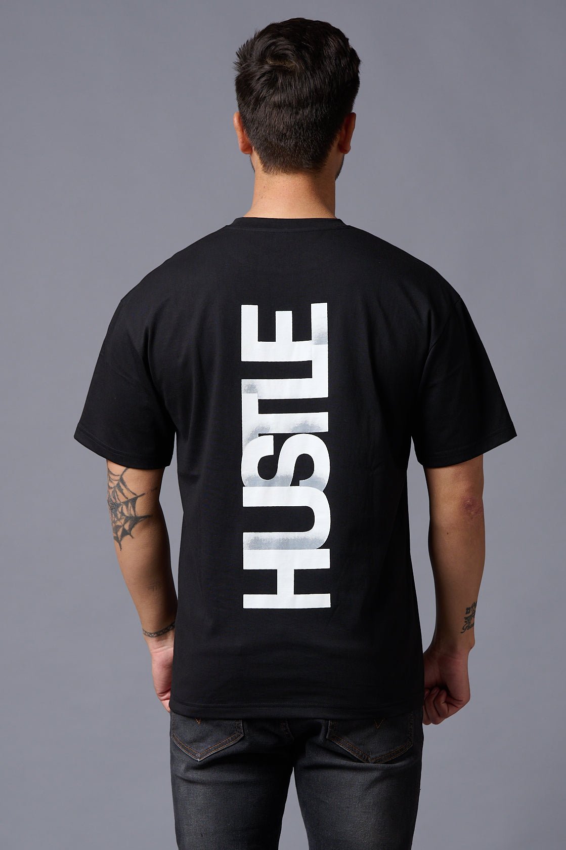 Hustle (in White) Printed Black Oversized T-Shirt for Men - Go Devil
