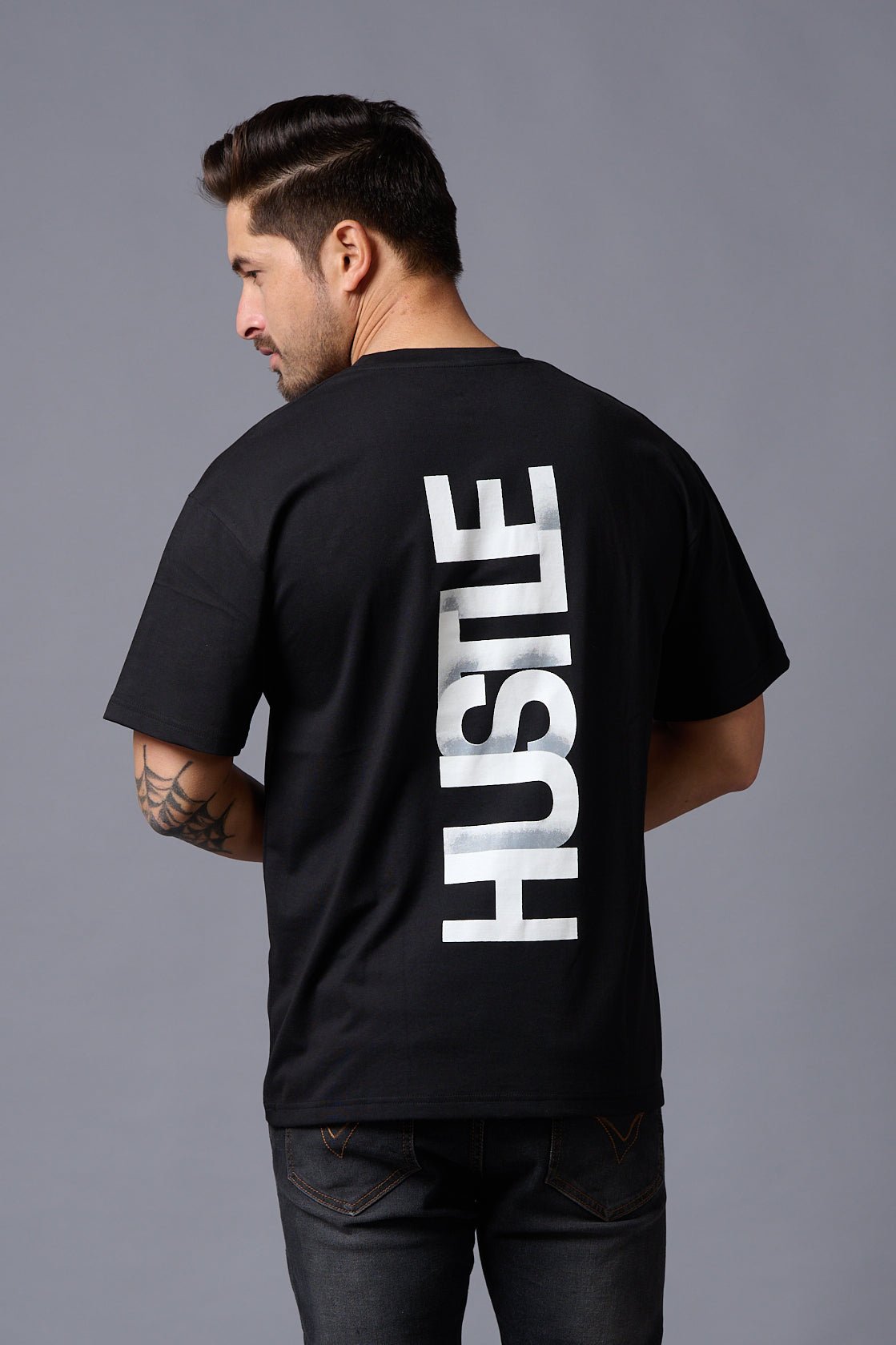 Hustle (in White) Printed Black Oversized T-Shirt for Men - Go Devil