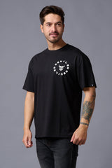 Hustle (in White) Printed Black Oversized T-Shirt for Men - Go Devil
