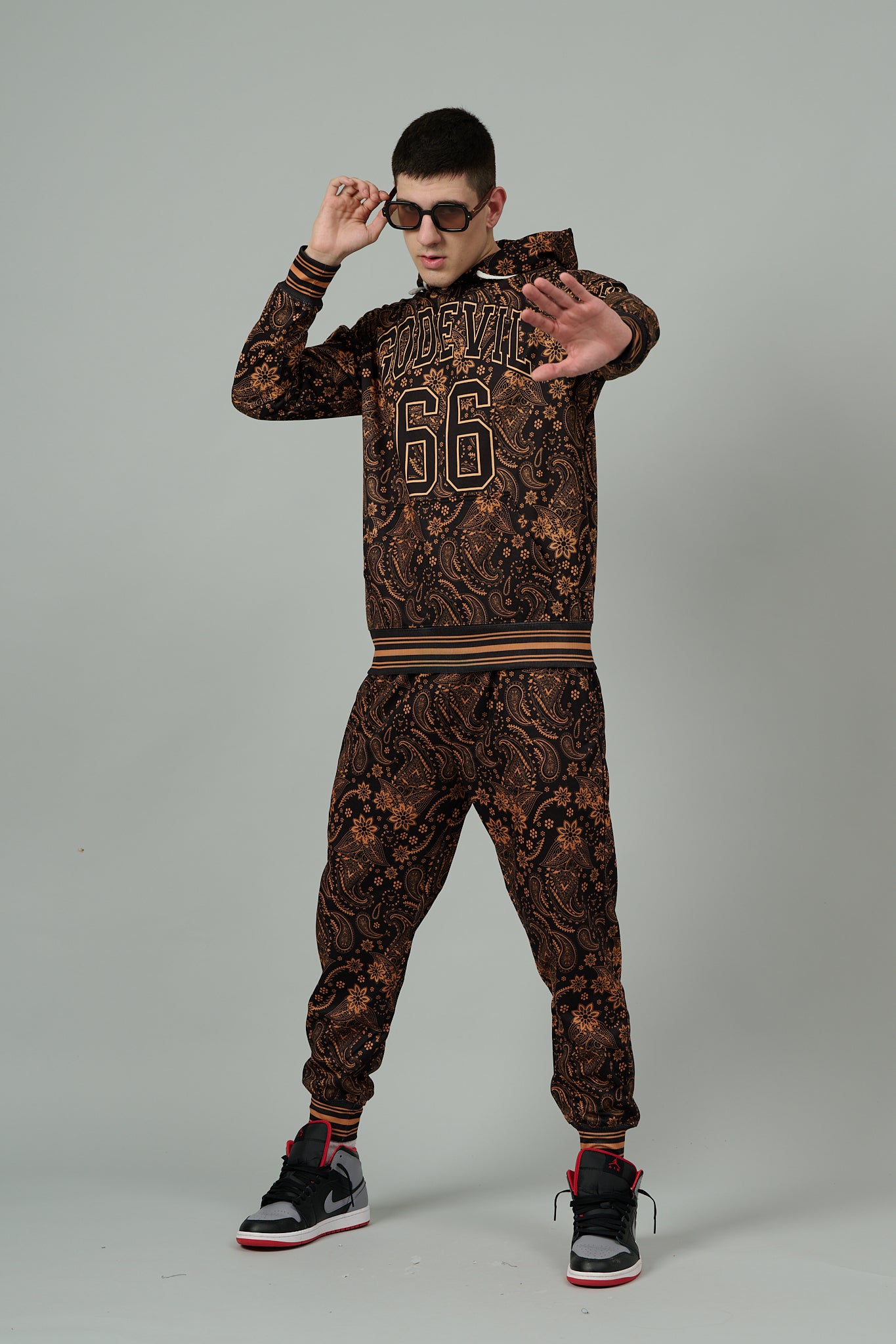 Go Devil 66 & Paisley Design (in Brown) Printed Black Hooded Cord Set for Men