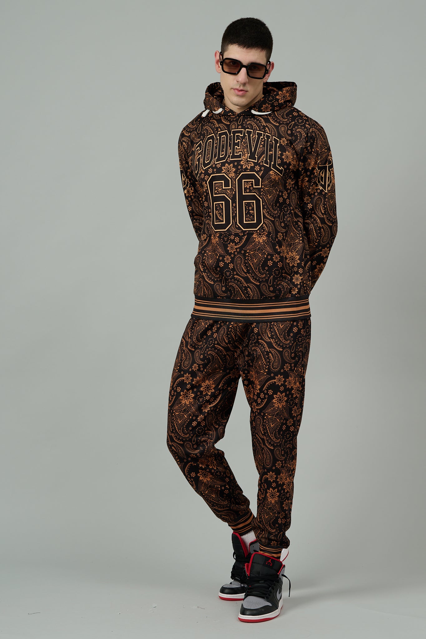 Go Devil 66 & Paisley Design (in Brown) Printed Black Hooded Cord Set for Men